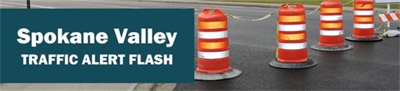 Traffic alert flash banner with construction cones